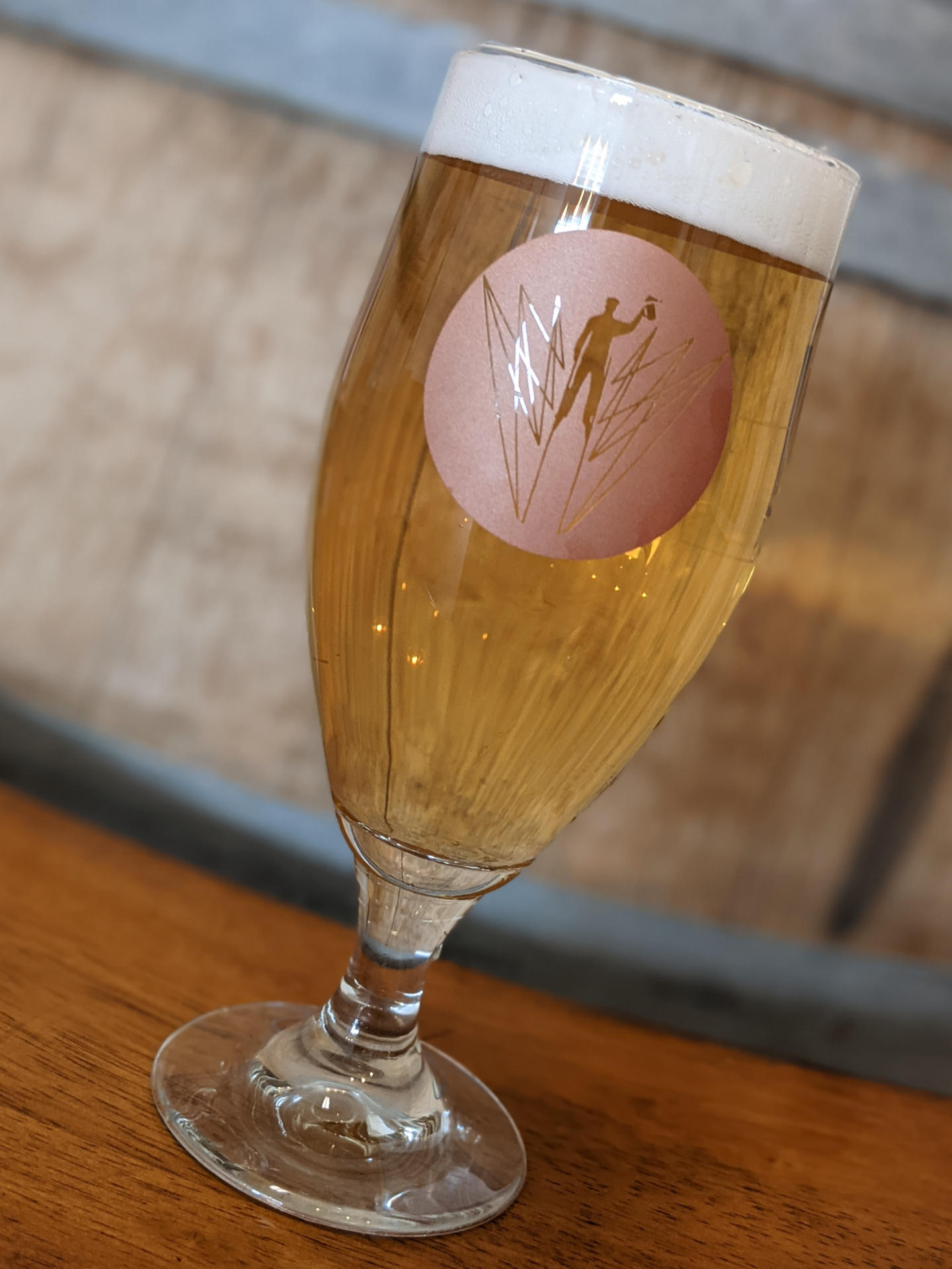 Luppoleto Beer in front of oak barrel.