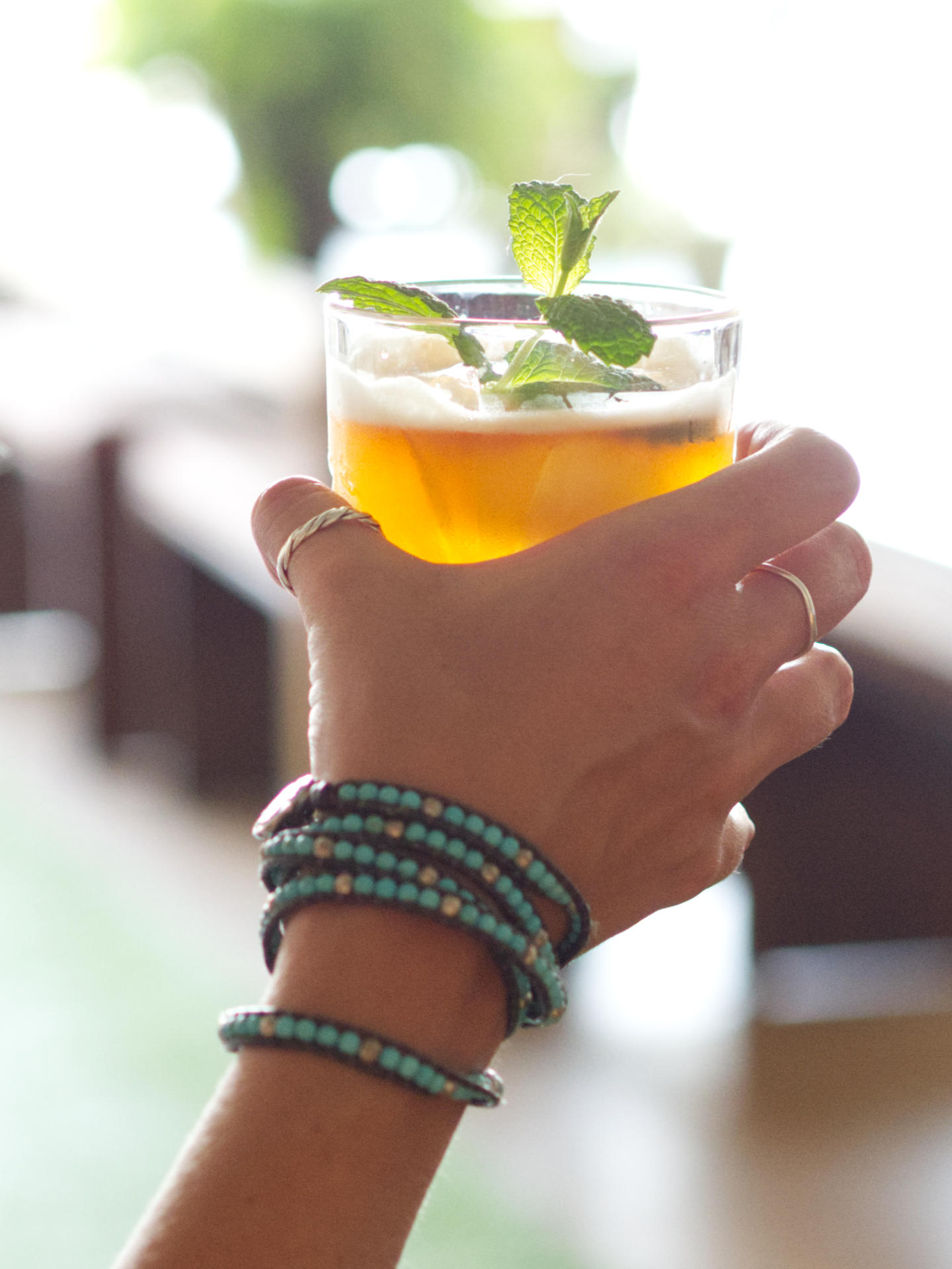 Taylor holding a Southern Drawl cocktail